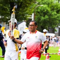 CdM Tim Indonesia Todotua Pasaribu Bawa Obor Asian Games di Nagoya